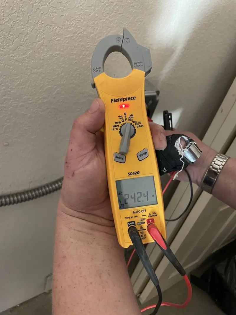 Voltage testing with clamp meter during Recessed Lighting Installation in Gold Canyon